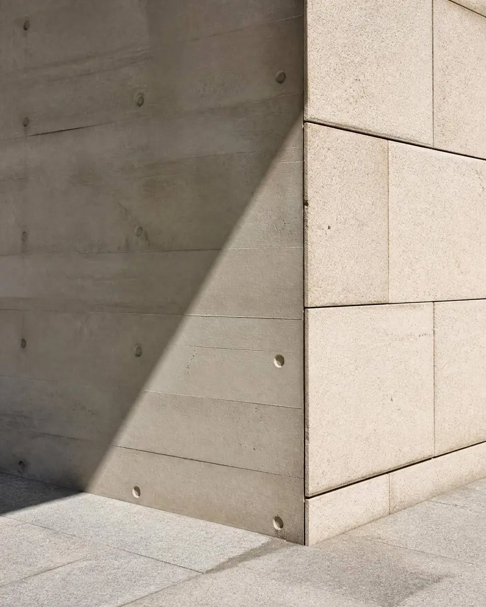 Concrete and granite architectural detail in raking daylight